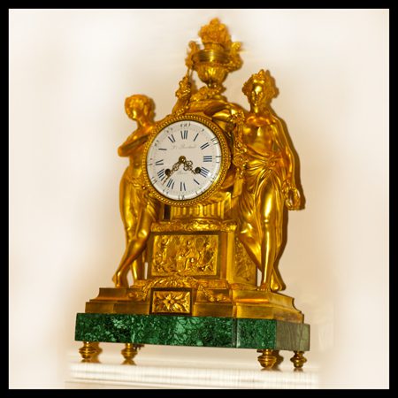 A stunning example of the bronze work on a mantel clock by Berthoud.