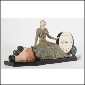 An Art Deco Mantel clock in the style of Chiparus.